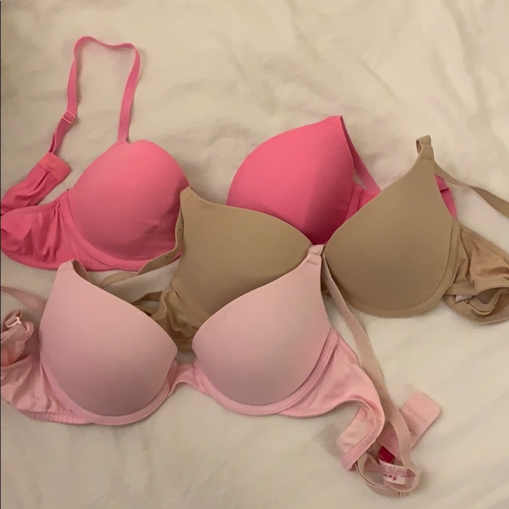 Three PINK bras
